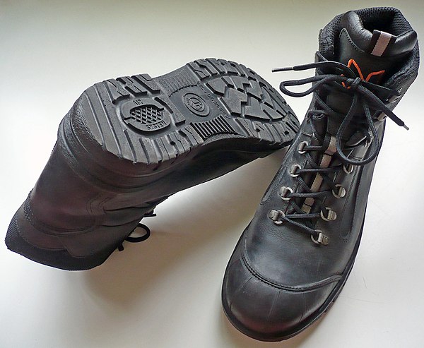 A pair of ISO 20345:2004 compliant S3 steel-toed safety boots designed for construction workers