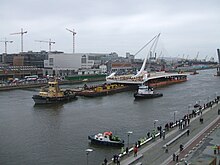 The main steel structure arriving by barge, May 2009 Samuel Beckett Bridge Dublin.jpg