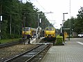 Two Mat '64's passing at Ommen railway station on the Emmerlijn
