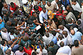 Image 3Photo and broadcast journalists interviewing government official after a building collapse (from Broadcast journalism)