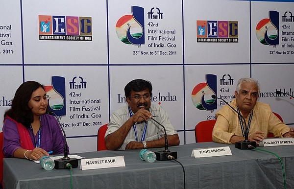 P. Sheshadri (middle) and H. G. Dattatreya (right) addressing a press conference during the 42nd International Film Festival of India, in Panaji, Goa