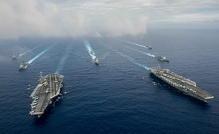 USS John C. Stennis (CVN-74) and USS Ronald Reagan (CVN-76) conducting dual carrier strike group operations as part of the United States Seventh Fleet