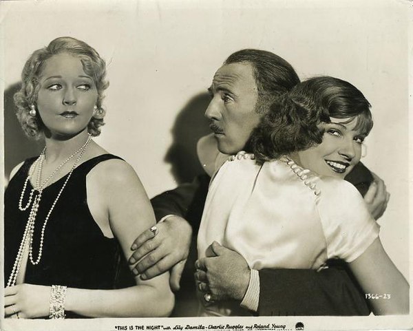 Todd, Roland Young, Lili Damita in This Is the Night (1932)
