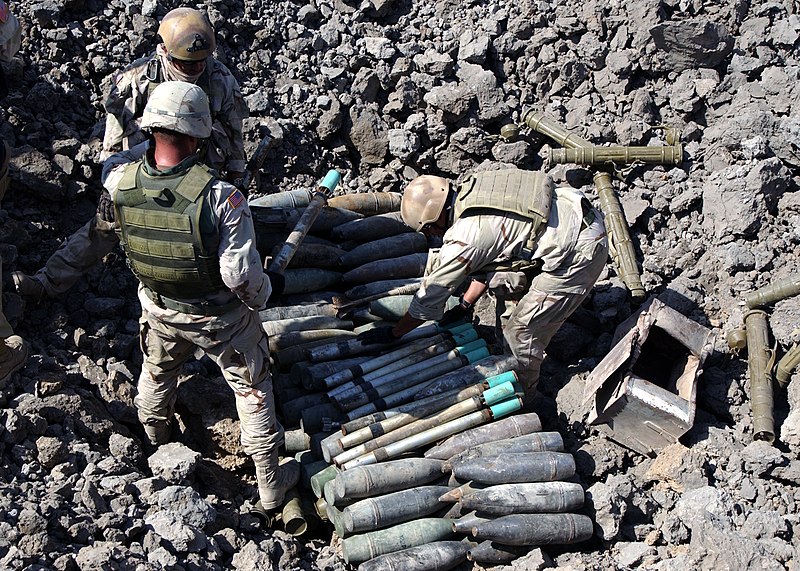 File:US Navy 031011-N-1938G-003 Navy Explosive Ordnance Disposal (EOD) technicians assigned to the Bahrain-based Special Operations Task Force 56, work with Army EOD technicians to prepare unexploded ordnance (UXO) for demolition.jpg