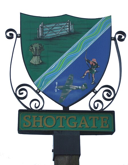 Village sign shotgate