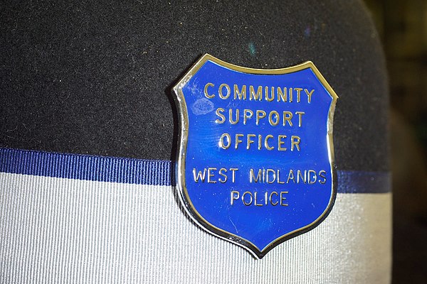 A metal shield, one of the different hat badge designs worn by PCSOs.