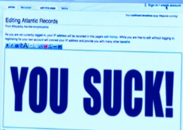 "Weird Al" Yankovic edits Atlantic Records' Wikipedia page to read "YOU SUCK!" in the music video for the song "White & Nerdy"