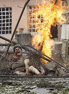 Woman crying for help during the Russian bombing of Gori Woman during Gori Bombing.jpg