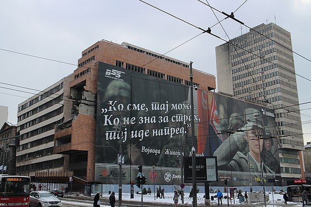 A propaganda billboard in Belgrade, bearing one of his quotations.