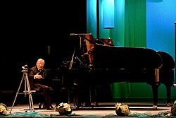 Vytautas Landsbergis plays piano in Sanok (Poland) at Cultural Center salon, 2013