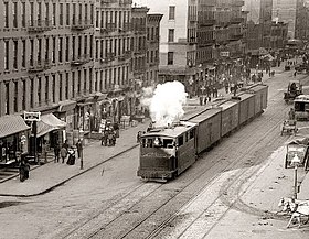 A steam freight train on 10th Avenue; the Kaufman Act would ban steam trains like this one within New York City 11th Avenue railroad G.G.Bain crop.jpg