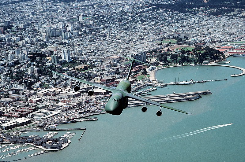 File:An air-to-air front view of a C-5 Galaxy aircraft, in a camouflage paint scheme, as it flies over San Francisco - DPLA - 829ea5b047f00fb5e1d8420b85056a9a.jpeg