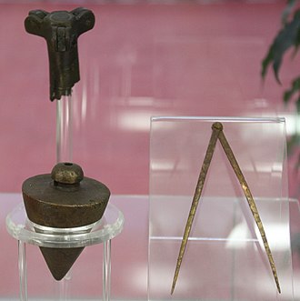 Equipment used by an ancient Roman land surveyor (gromatici), found at the site of Aquincum, modern Budapest, Hungary Aquinqum BHM IMG 0662 land surveyor equipment.jpg