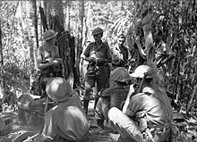 Lieutenant Colonel A.G. Cameron, commanding officer, delivering orders for a patrol around Menari, September 1942 Australian 3rd Infantry Battalion orders group September 1942 Menari (AWM image 027010).JPG