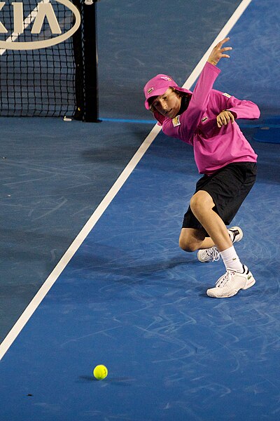 A ball boy in action