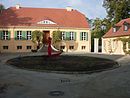 Residential house (Biedermeier house) with outbuildings and garden