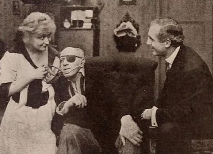 left to right: Bessie Barriscale, Joseph Dowling, ?unidentified player. Blindfolded (1918)