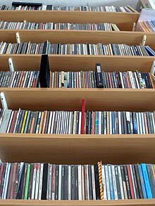 A CD collection pictured in 2007; the proliferation of music production in the format informed Christgau's reviewing and grading standards throughout the preceding decade. CD collection.jpg