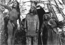 Photograph from the film, featuring Baluk (Long Lace, left) and Chetoga (Yellow Robe, center) Chauncey Yellow Robe, "Silent Enemy", 1928.png