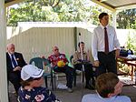 Four of the candidates who stood for election for the Division of Chifley at the 2007 federal election address electors at a public meeting in Shalvey on 11 November 2007. They are (seated at rear) Roger Price (ALP), Dave Vincent (CDP), James Cogan (Socialist) and (standing) John Forrester (Greens) Chifley candiidates meeting nov 2007.jpg