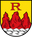 Stadt Rothenfels In Gold über silbernen Wellen drei rote Felsen, der mittlere überhöht von dem roten Großbuchstaben R.