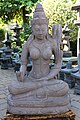 Stone figure of the rice goddess Dewi Sri with Vitarka Mudra