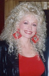 Dolly Parton at a recording session c. 1989 Dolly Parton with square red earrings.jpg