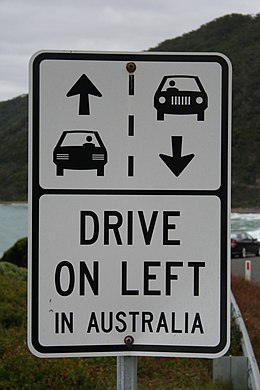 A sign on the Great Ocean Road, heavily visited by international tourists, reminding motorists to keep left in Australia