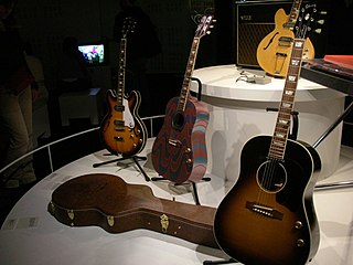 Epiphone 1965 Casino, Gibson EJ-160E (The Fool), Gibson J-160E (sunburst) with Bed-In signed case, VOX AC30, Epiphone Revolution Casino, and VOX Continental - Exposition John Lennon unfinished music (2006-04-30 15.39.04 Benoit Darcy).jpg