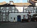 Half-timbered eaves house