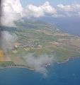 Flying towards the north end of the island, looking down part of the west or Caribbean coast