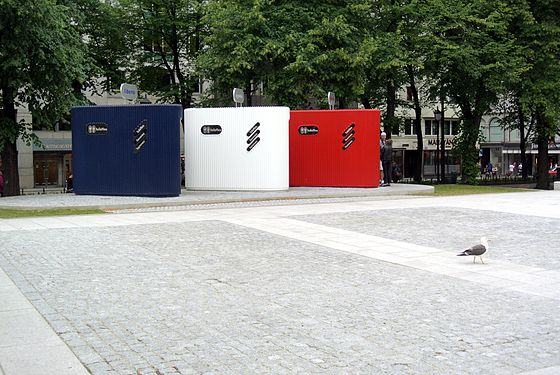 French-made public toilets displaying the national colors of France in the city center of Oslo