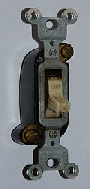 A "T-rated" wall switch (the T is for Tungsten filament)[9] that is suited for incandescent loads.