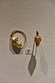 Gold earring with Maenad's' head, 3rd cent. B.C. National Archaeological Museum, Athens.