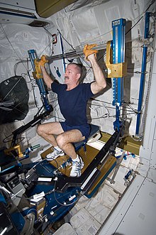 Burbank exercises in the Tranquility module of the International Space Station. ISS Expedition 30 Burbank exercises.jpg