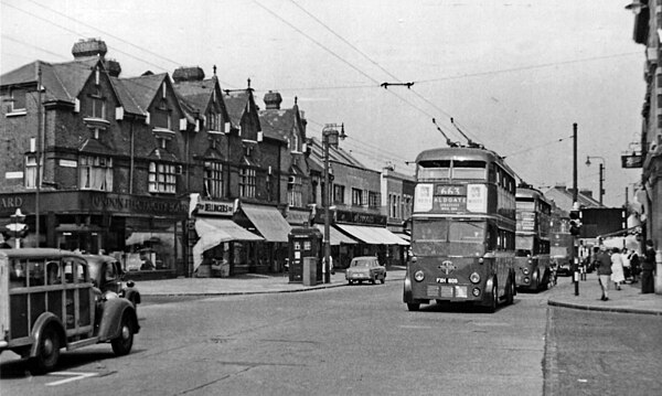 Two west-bound trolleybuses on Romford Road, Ilford, in July 1955