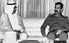 Kuwaiti Prime Minister Alaa Hussein Ali 1990 with Iraqi President Saddam Hussein.jpg