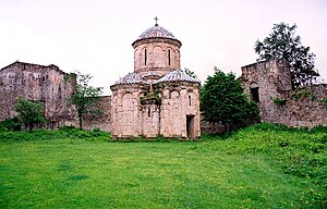 The church with the dome and the ruins of the Kwetera complex