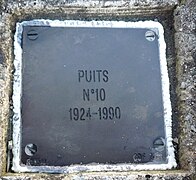 La plaque indique 1924-1990.