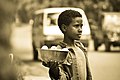 You boy selling Lemon in outskirts of Addis Ababa Photo by Natnael Tadele, under CC BY-SA 4.0