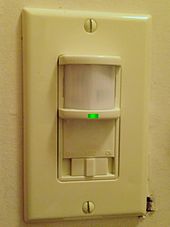 An indoor light switch equipped with PIR-based occupancy sensor Light switch with passive infrared sensor.jpg