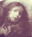 Girl with head tilted to shoulder 1864 albumen print 17.4 x 15.0 cm. (arched and trimmed)