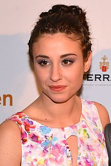 Photo of a young woman in a floral dress