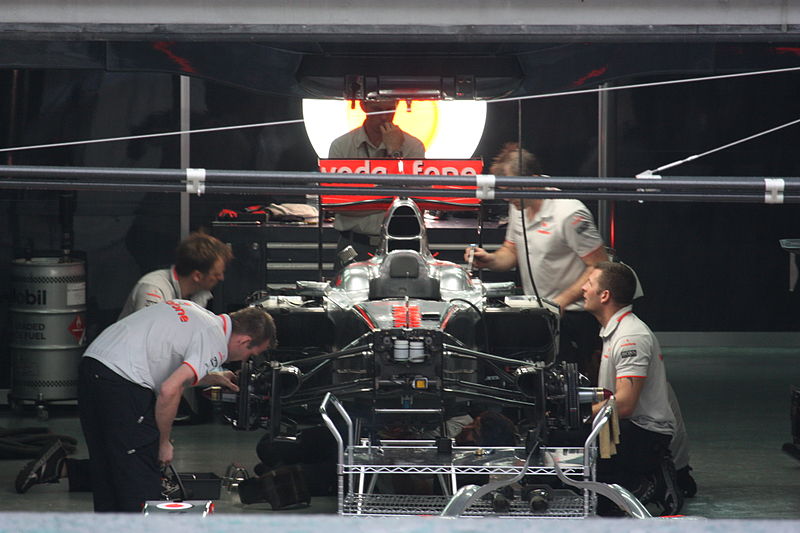 File:McLaren Malaysian GP 2010 garage.jpg