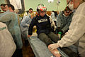 Medical volunteers performing medical aid to the wounded journalist in a makeshift hospital. Clashes in Kyiv, Ukraine. Events of February 18, 2014-2