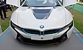 * Nomination BMW i8. Mattbuck 07:00, 17 September 2014 (UTC) * Promotion Nice, although a noise reduction would make justice to this nice subject --Poco a poco 08:22, 17 September 2014 (UTC)  Comment I think the legs at the left are very disturbing. But this is only my opinion. -- Spurzem 09:04, 17 September 2014 (UTC)in my eyes are photos of cars with wide-angle mostly no QI. --Ralf Roletschek 13:08, 17 September 2014 (UTC) Der berühmte Motorsportfotograf Julius Weitmann lehnte es ab, Autos mit Weitwinkel zu fotografieren. -- Spurzem 16:22, 17 September 2014 (UTC)