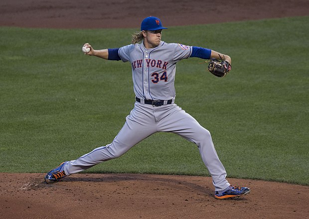 Major League Baseball player Noah Syndergaard pitching for the New York Mets in 2015