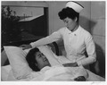 Nurse Aiko Hamaguchi and patient Toyoko Ioki, Manzanar Relocation Center, California.tif