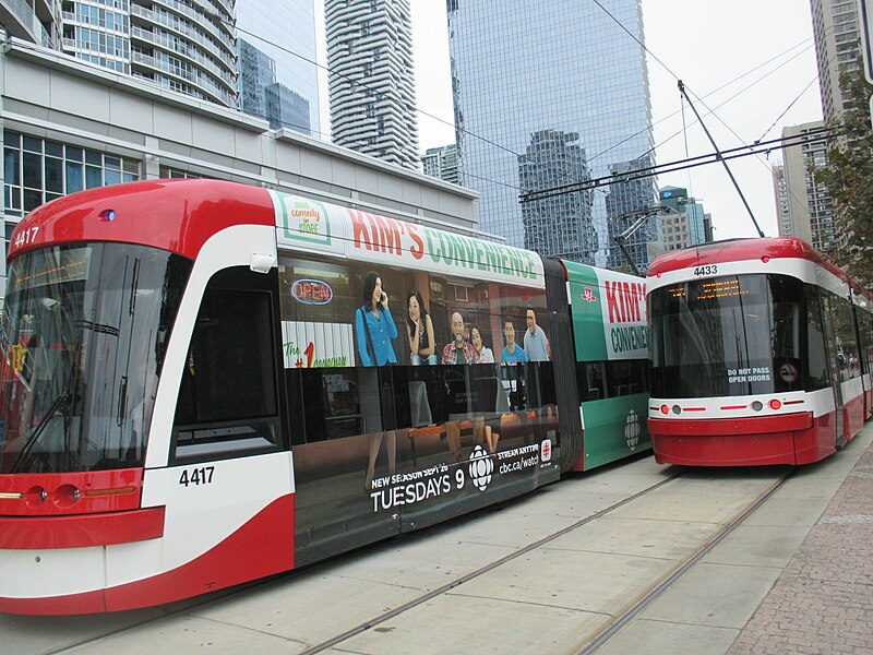 File:Pantograph & trolley pole on Queens Quay West (4417&4433).jpg