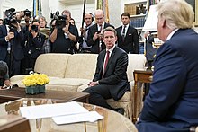Sharpless, as acting Commissioner of Food and Drugs, in the Oval Office with President Donald Trump in 2019 President Trump Announces Plan to Remove Flavored E-Cigarette Products From the Market (48721903623).jpg